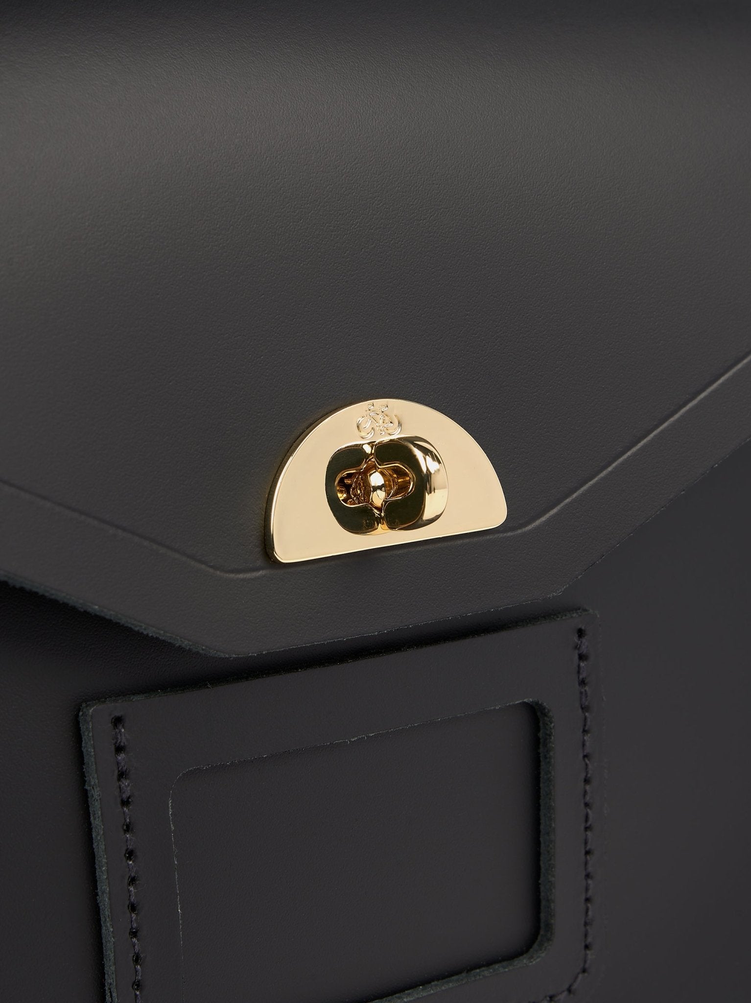 cambridge satchel company black double buckle square leather backpack The Twist Lock Satchel